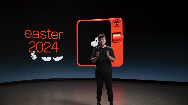 Jesse Lyu, the founder of the tech start-up rabbit, demonstrates the device’s capabilities