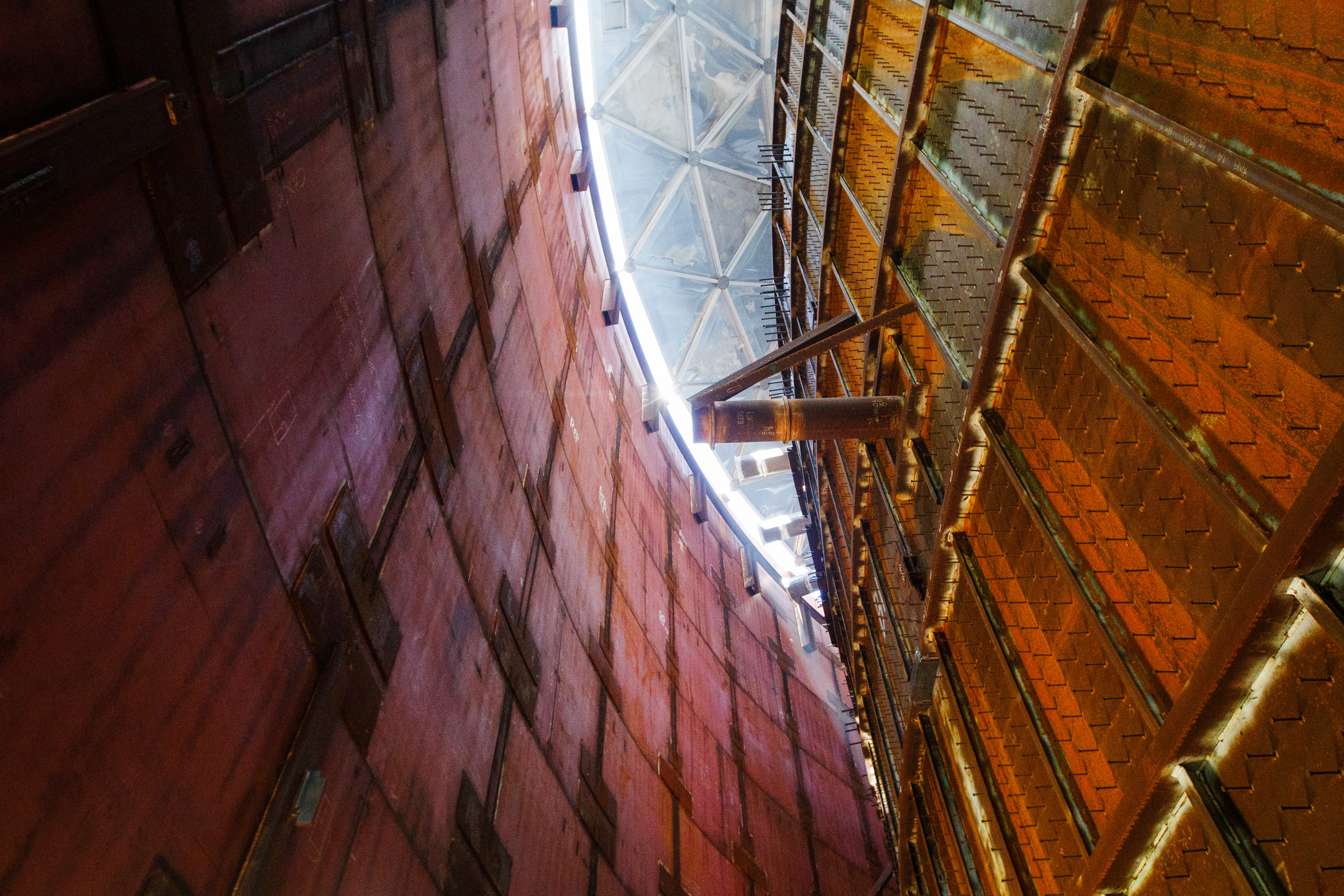 Casings for the reactor are being welded inside huge cylindrical temporary buildings, or bunkers